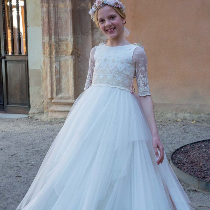 vestido de comunión Menninas en tul bordado con lazada rosa de plumeti
